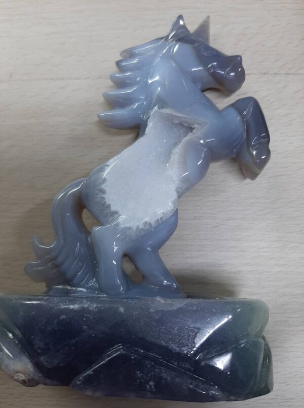 Agate in fluorite base unicorn