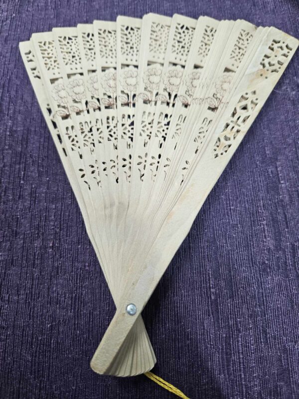 Wooden hand fan