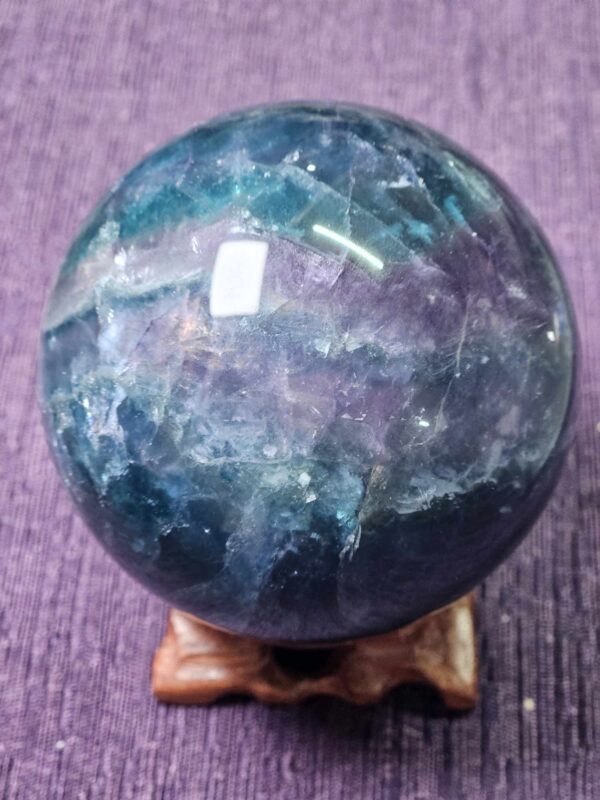 Rainbow fluorite sphere (with blue)