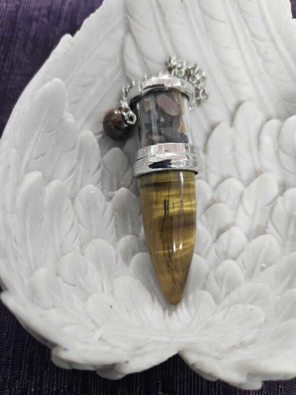 Bullet pendulum with chips- tiger eye