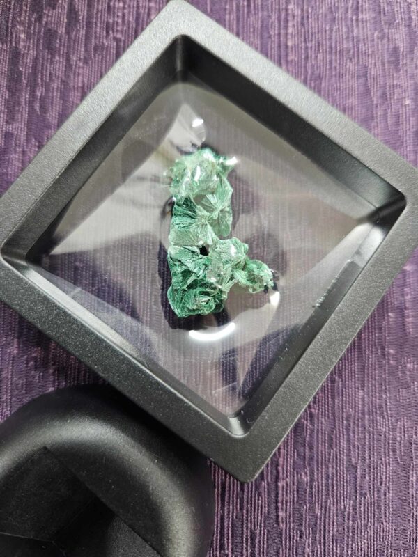 Raw malachite in frame