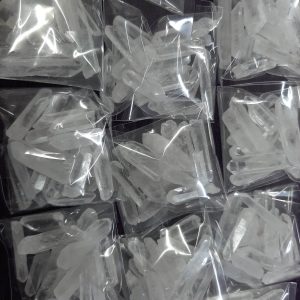 Small packs of fine clear quartz shards