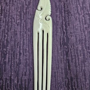 Bone carving comb- feather