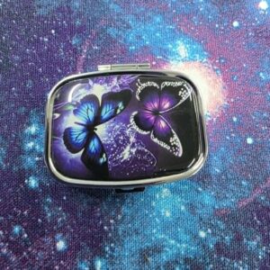 Pill tin- butterfly